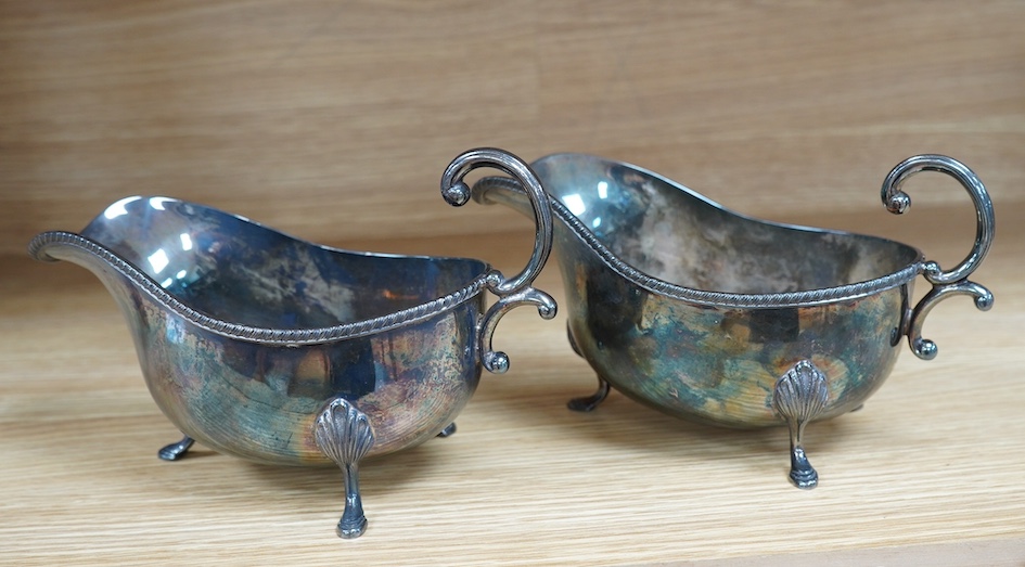 A pair of ERII monogrammed plated sauceboats, 20cm. Condition - fair to good